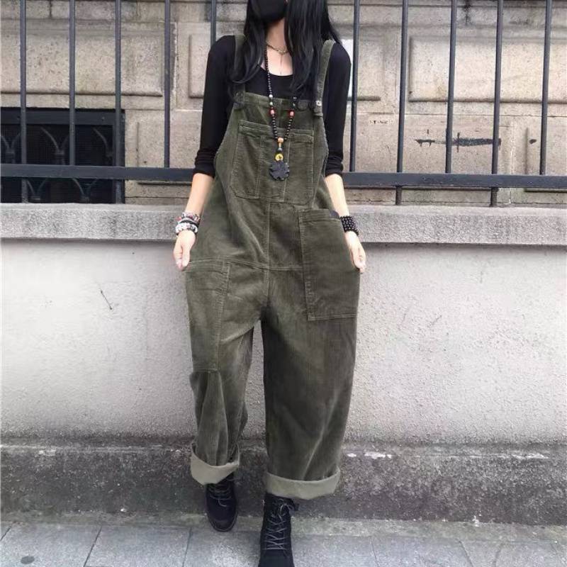 A corduroy dress with suspenders. A black dress, with retro-inspired designs.