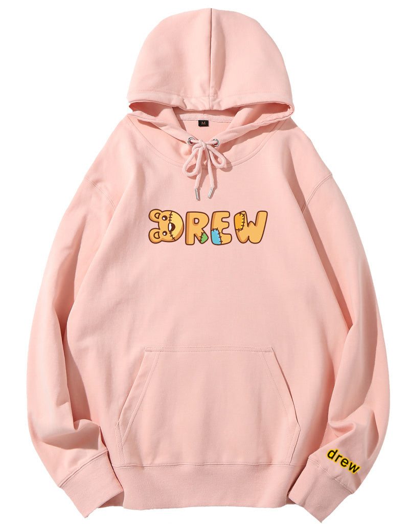 Pink hoodie with pink text graphic on the front and a small logo on the lower right sleeve.