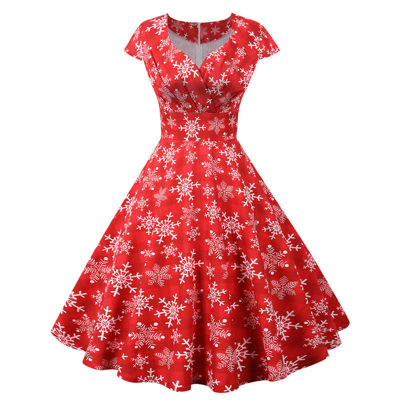 Red dress with white snowflake pattern on a white background