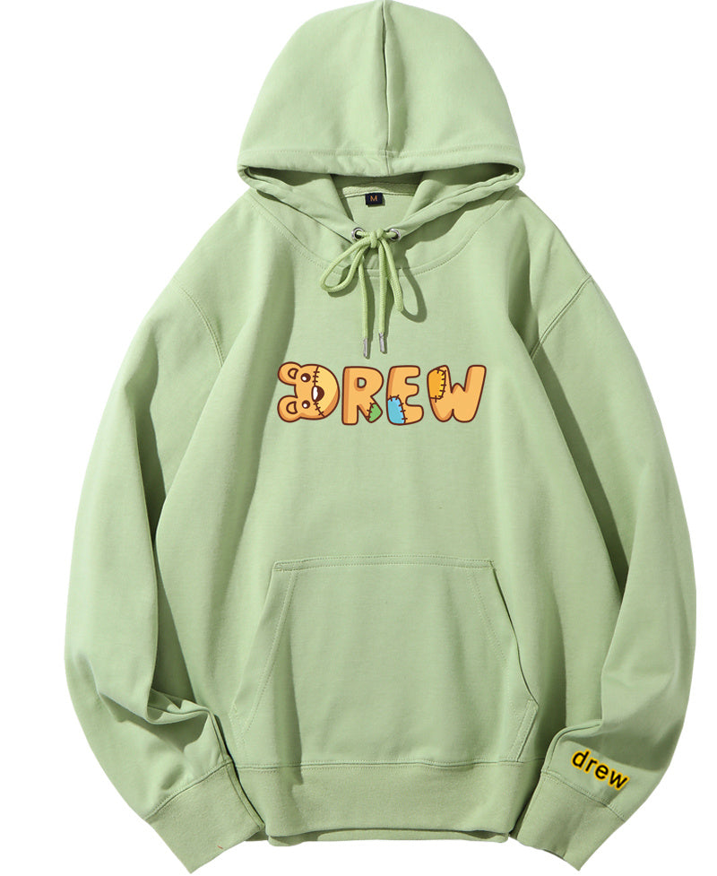 Green hoodie with pink text graphic on the front and a small logo on the lower right sleeve.