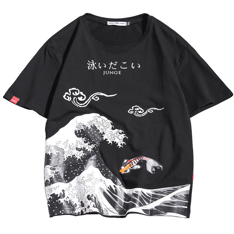 A black Urban Flow Graphic Tee displayed on a mannequin, featuring a graphic print with waves and a fish.