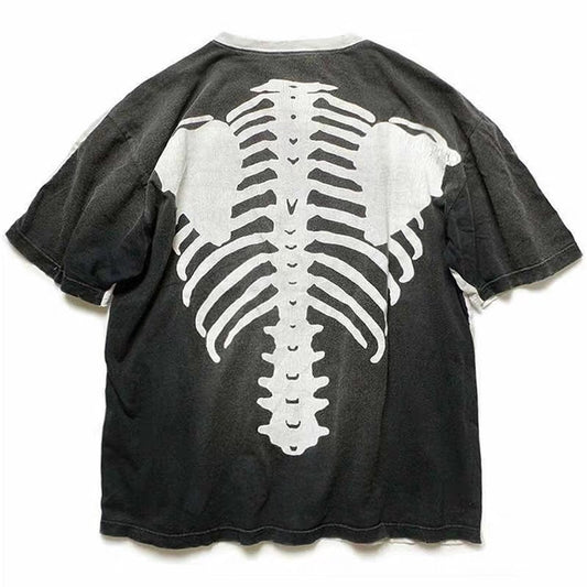 Black oversized rap shirt with a bold white skeleton graphic print on the back, featuring a round neck and short sleeves.