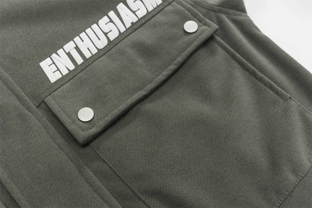 A black Urban Vibe Loose Fit Printed Jacket with a mandarin collar, zipper front, and printed text on the chest.
