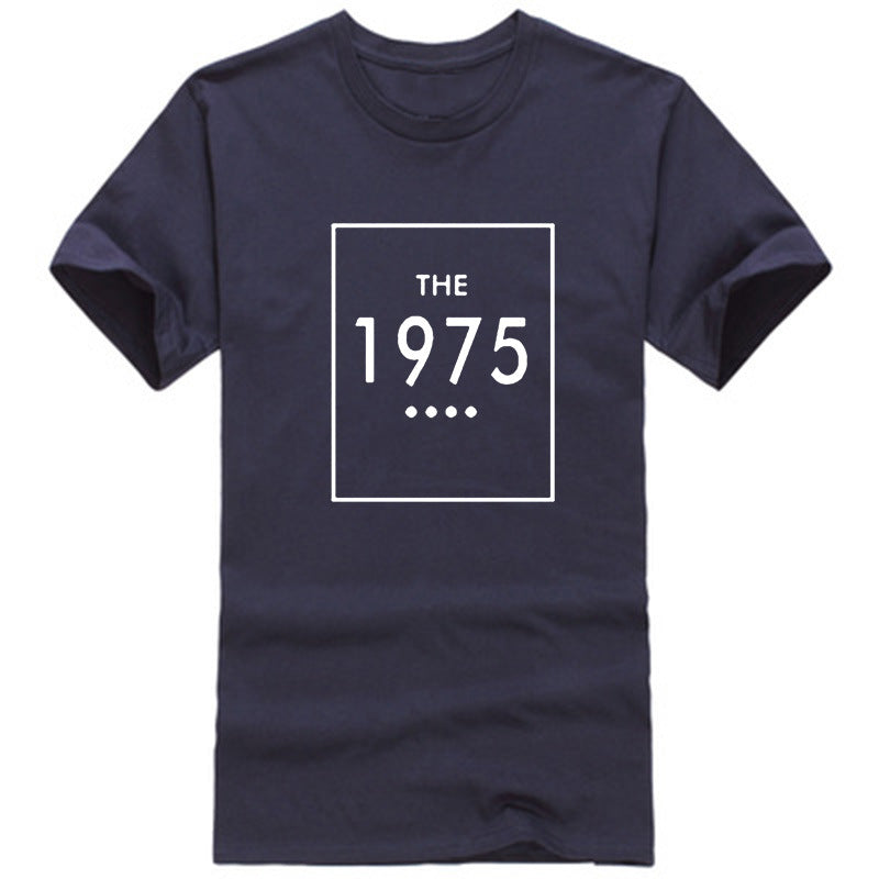 A black oversized t-shirt with 'THE 1975' printed in black lettering on the front.
