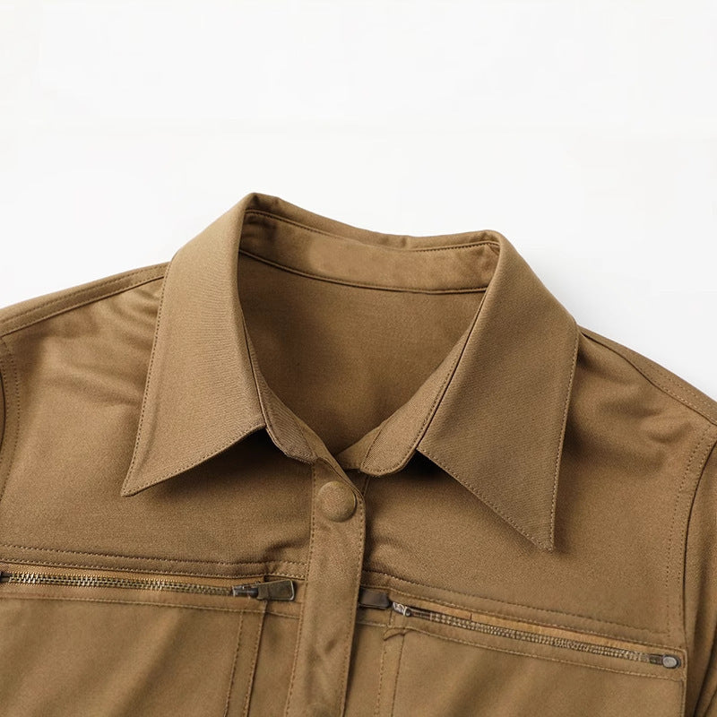 A belteds work dress with plant and flower embroidery on the chest area, in a mid-length style with a high waist and short sleeves, in a khaki color.