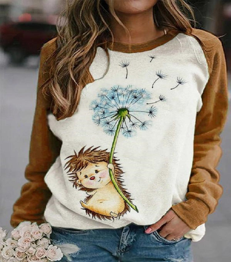 A casual long-sleeved Urban Vibes Hedging Top with a print of a smiling sloth hanging from a tree, with the text 'Helloo.