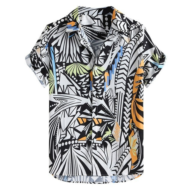 A short-sleeved Urban Luau shirt with a geometric pattern featuring black, white, yellow, and blue colors, displayed on a wooden hanger.