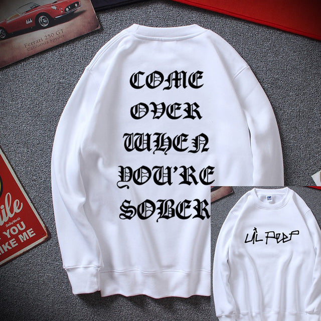 A white fleece sweatshirt with white text on the back reading 'COME OVER WHEN YOU'RE SOBER' and the brand name 'LIL PEEP' on the front.