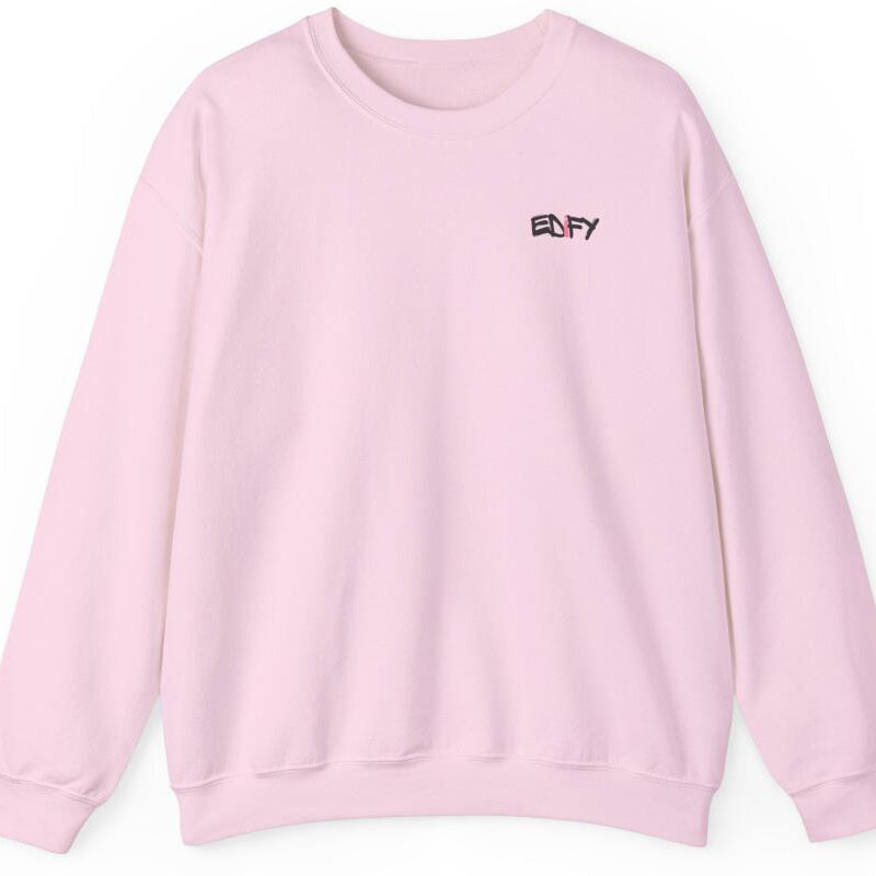 A pink crewneck sweatshirt with a bold black printed text on the chest.