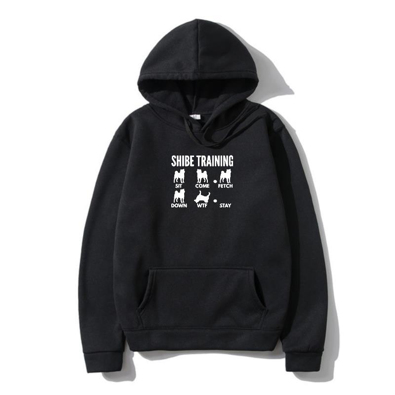 A black hoodie with 'URBAN TRAINER' text and illustrations of dogs on the front.