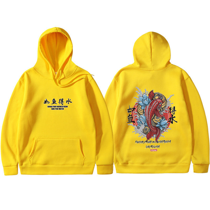 A yellow urban hoodie with a traditional Japanese art print in the center, featuring an animal and floral elements.