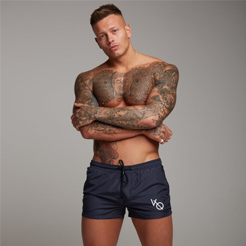 New Mens Sexy Swimsuit Swimwear Men Swimming Shorts Men Briefs Beach Shorts Sports Suits Surf Board Shorts Men Swim Trunks Sean Powell Apparel