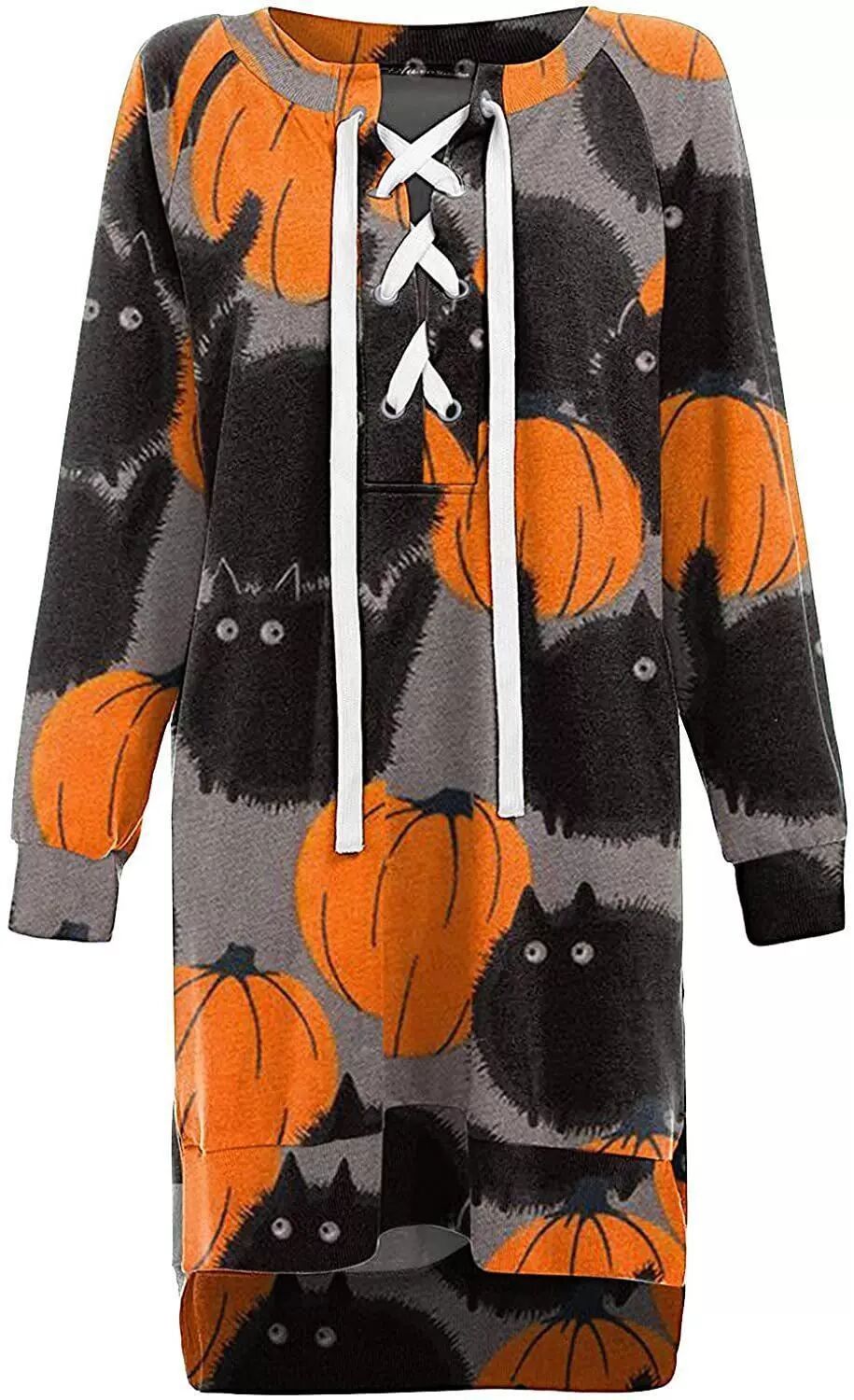 Halloween-themed cardigan with pumpkins and cats on a white background