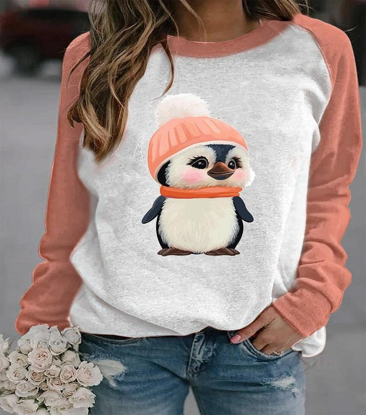 A casual long-sleeved Urban Vibes Hedging Top with a print of a smiling sloth hanging from a tree, with the text 'Helloo.