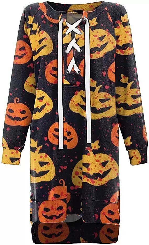 Halloween-themed dress with pumpkin patterns on a black background