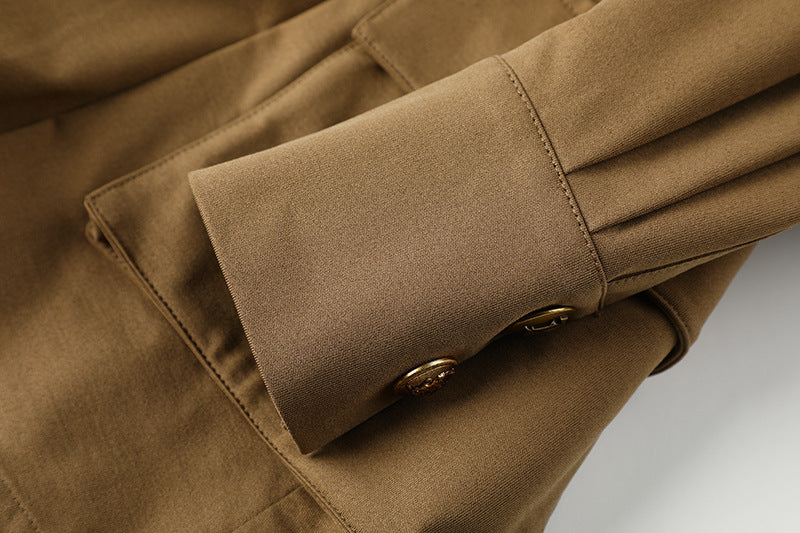 A belteds work dress with plant and flower embroidery on the chest area, in a mid-length style with a high waist and short sleeves, in a khaki color.