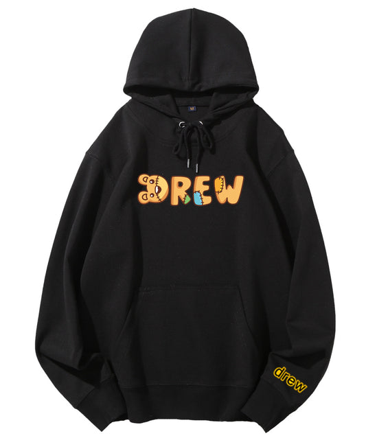 Black hoodie with pink text graphic on the front and a small logo on the lower right sleeve.