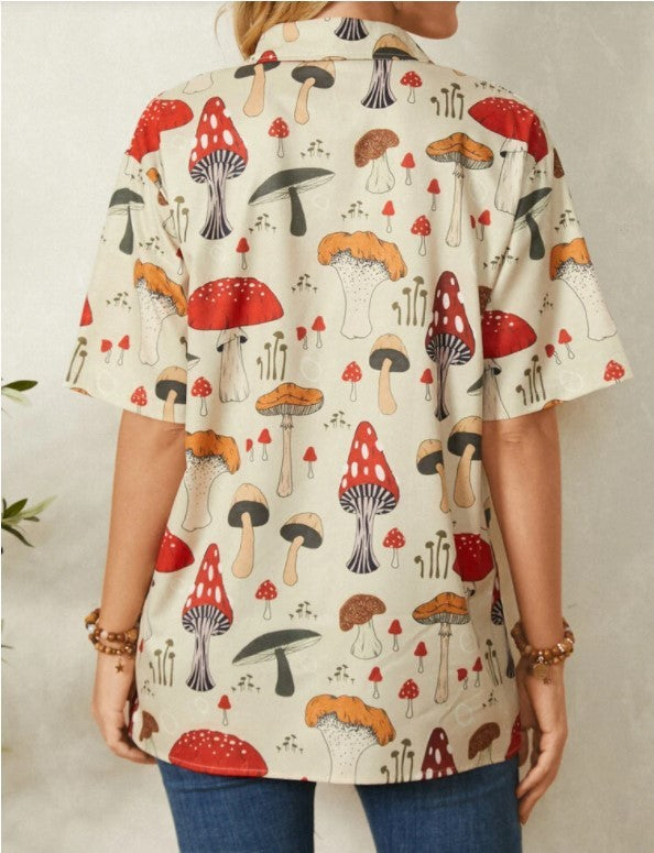 A woman wearing a yellow Urban Casual Lapel Shirt with a mushroom print, paired with blue jeans and a brown belt.