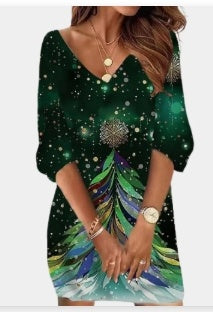 Green dress with tree design worn by a person