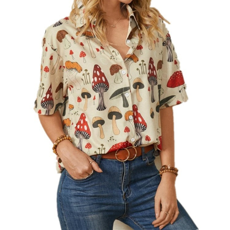 A woman wearing a yellow Urban Casual Lapel Shirt with a mushroom print, paired with blue jeans and a brown belt.