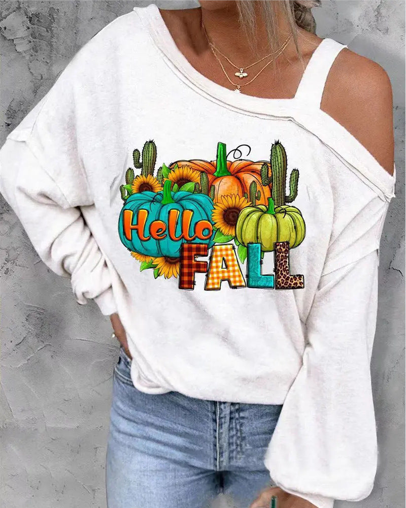 White sweatshirt with 'Hello Fall' and pumpkin design on a gray background