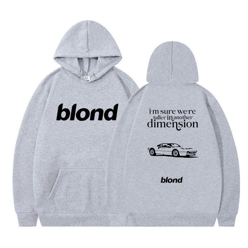 Black hoodie with 'blond' written twice and a graphic of a car on the back, with the text 'i'm sure we're all in another dimension'.