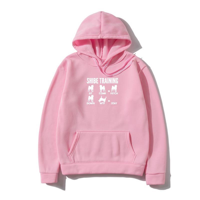 A pink hoodie with 'URBAN TRAINER' text and illustrations of dogs on the front.