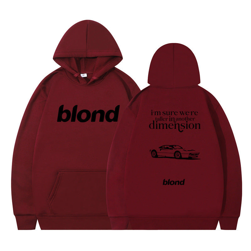 Black hoodie with 'blond' written twice and a graphic of a car on the back, with the text 'i'm sure we're all in another dimension'.