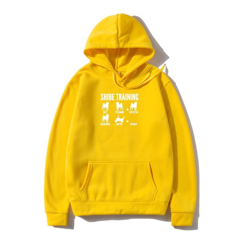 A yellow hoodie with 'URBAN TRAINER' text and illustrations of dogs on the front.