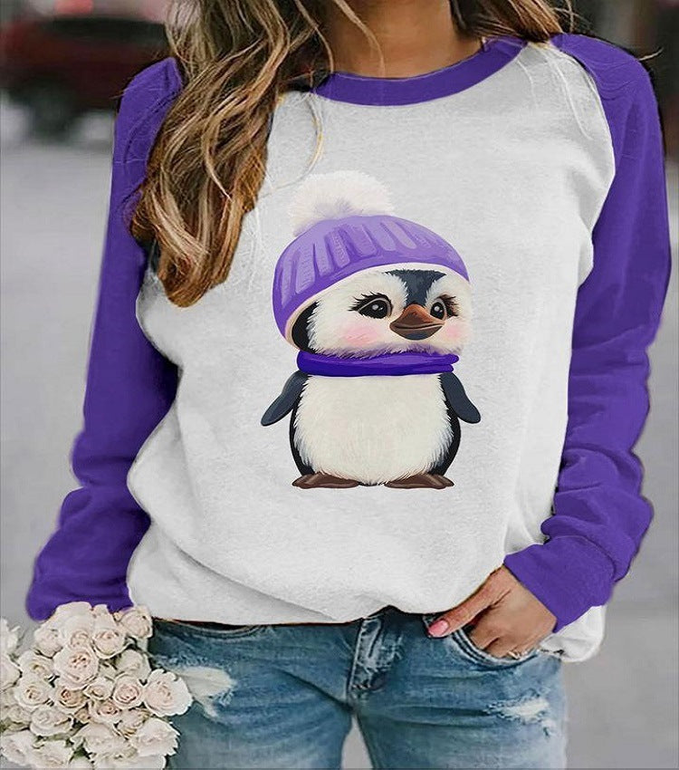 A casual long-sleeved Urban Vibes Hedging Top with a print of a smiling sloth hanging from a tree, with the text 'Helloo.