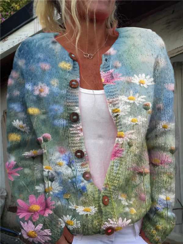 Knitted cardigan with floral pattern worn by a person