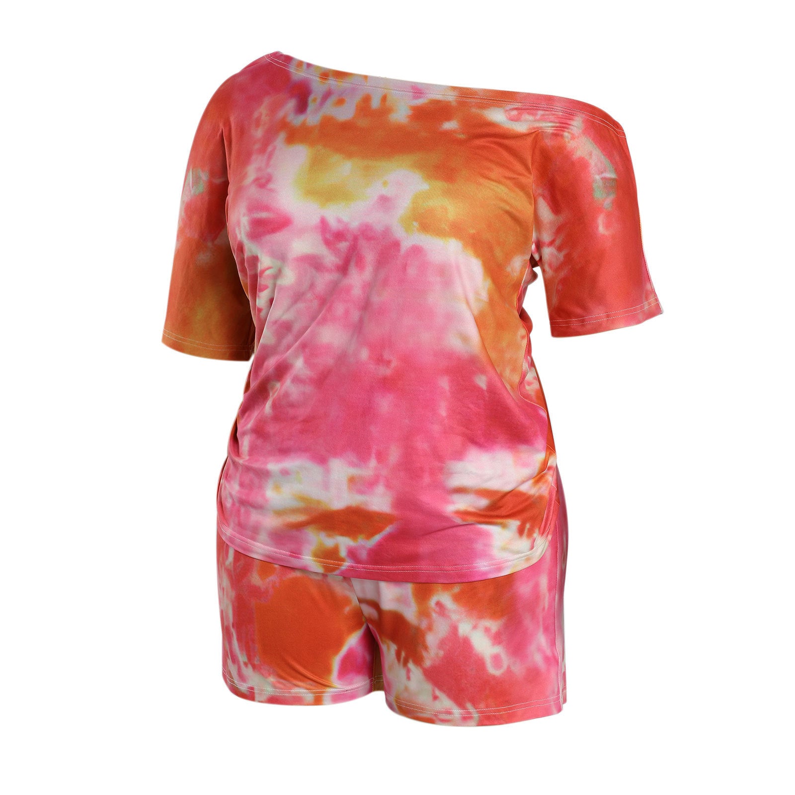 A model wearing a red and pink tie-dye print top and shorts set.