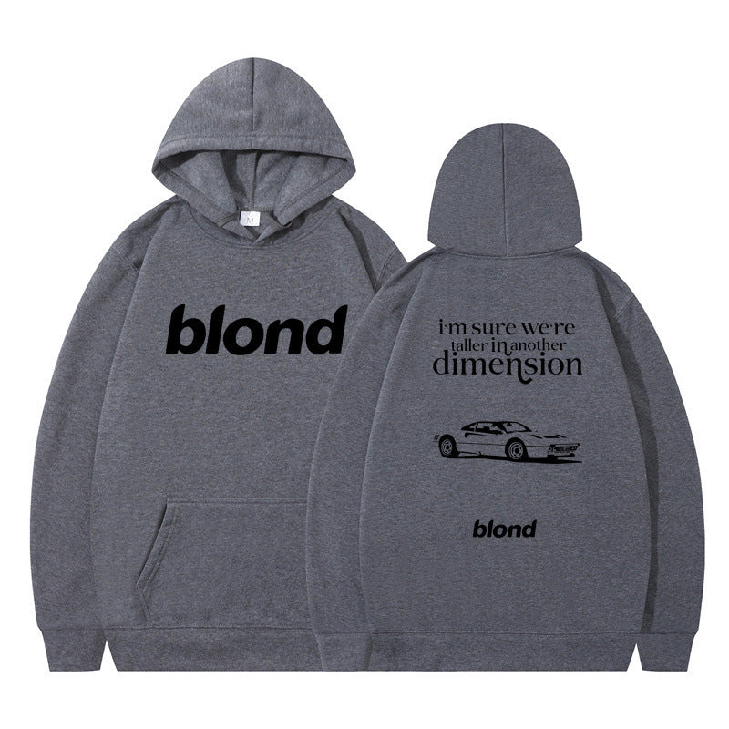 Black hoodie with 'blond' written twice and a graphic of a car on the back, with the text 'i'm sure we're all in another dimension'.