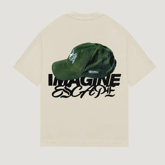 A beige Urban Core Casual T-Shirt with a digital print of a hat and the text 'IMAGINE ESCAPE'.