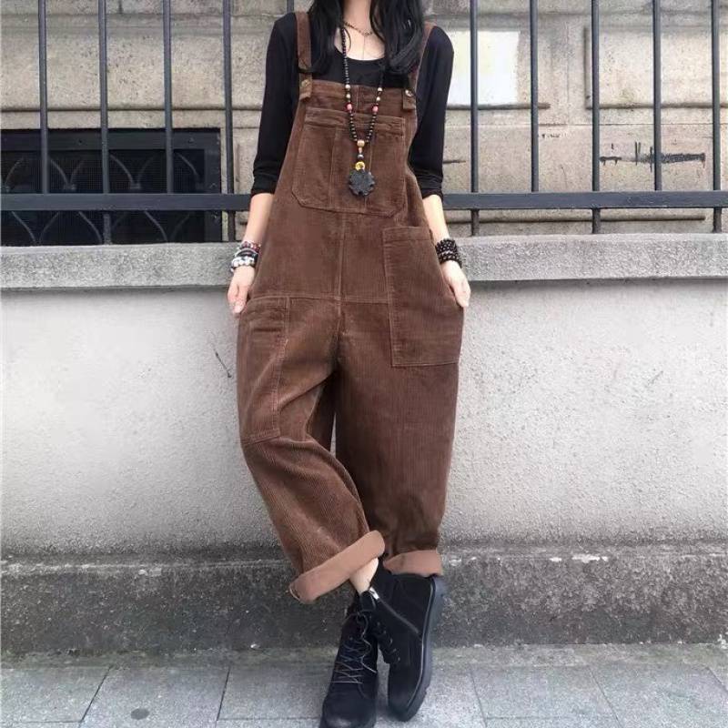 A corduroy dress with suspenders. A black dress, with retro-inspired designs.