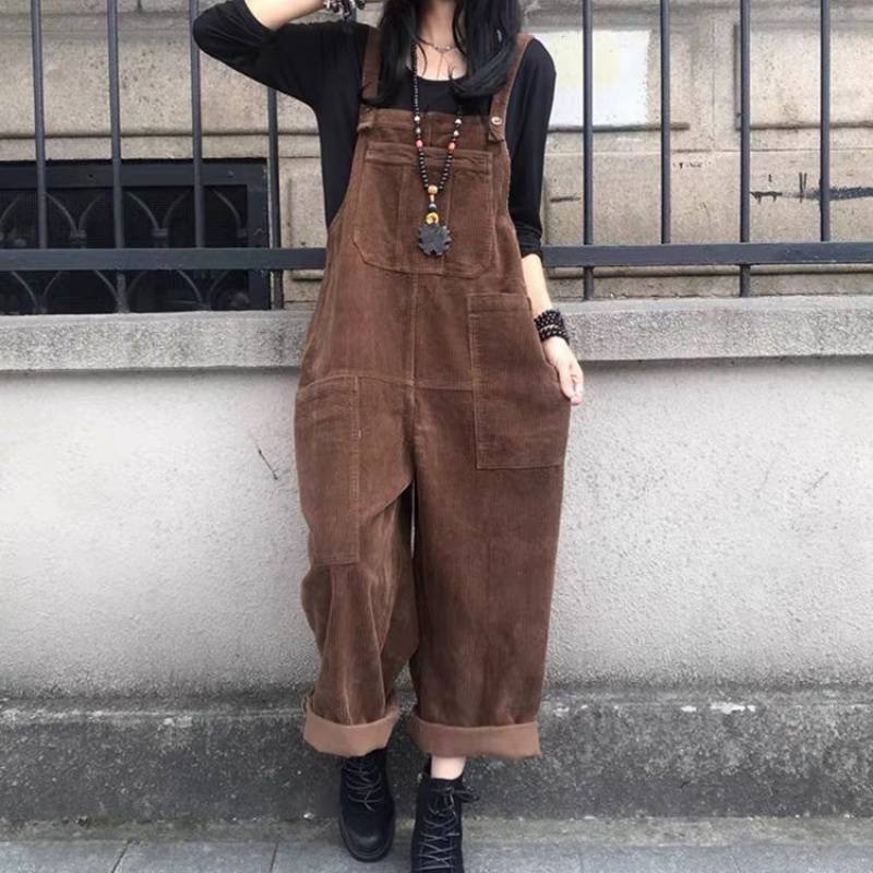 A corduroy dress with suspenders. A black dress, with retro-inspired designs.