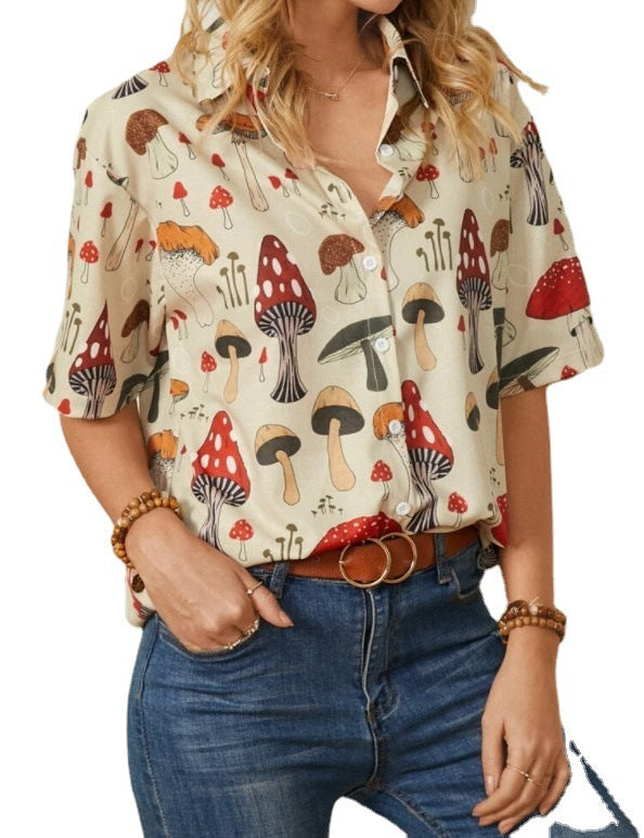 A woman wearing a yellow Urban Casual Lapel Shirt with a mushroom print, paired with blue jeans and a brown belt.