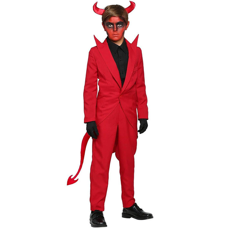 Person wearing a red devil costume with horns and a tail on a white background