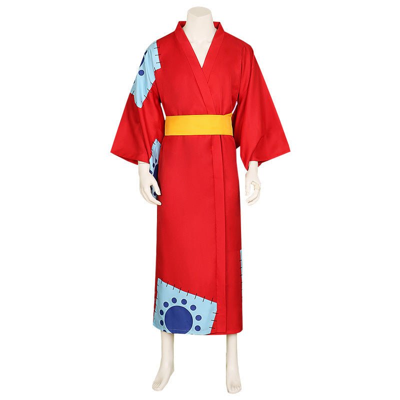 Red robe with blue accents and a yellow belt on a mannequin against a white background