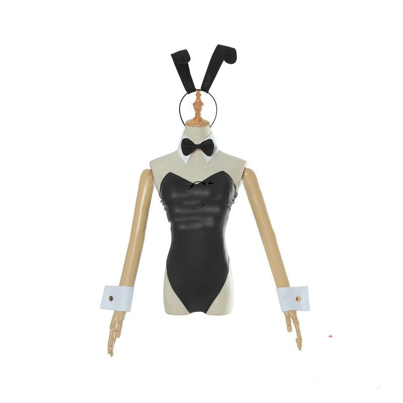 Mannequin wearing a black and white outfit with a bow tie on a white background