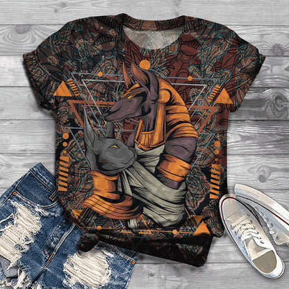 T-shirt with a graphic design of a stylized animal figure on a wooden surface with jeans and shoes.