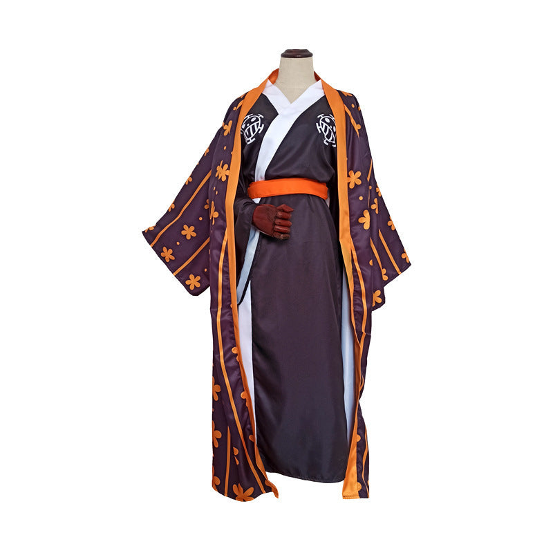Traditional Japanese kimono with orange and purple patterns on a mannequin against a white background
