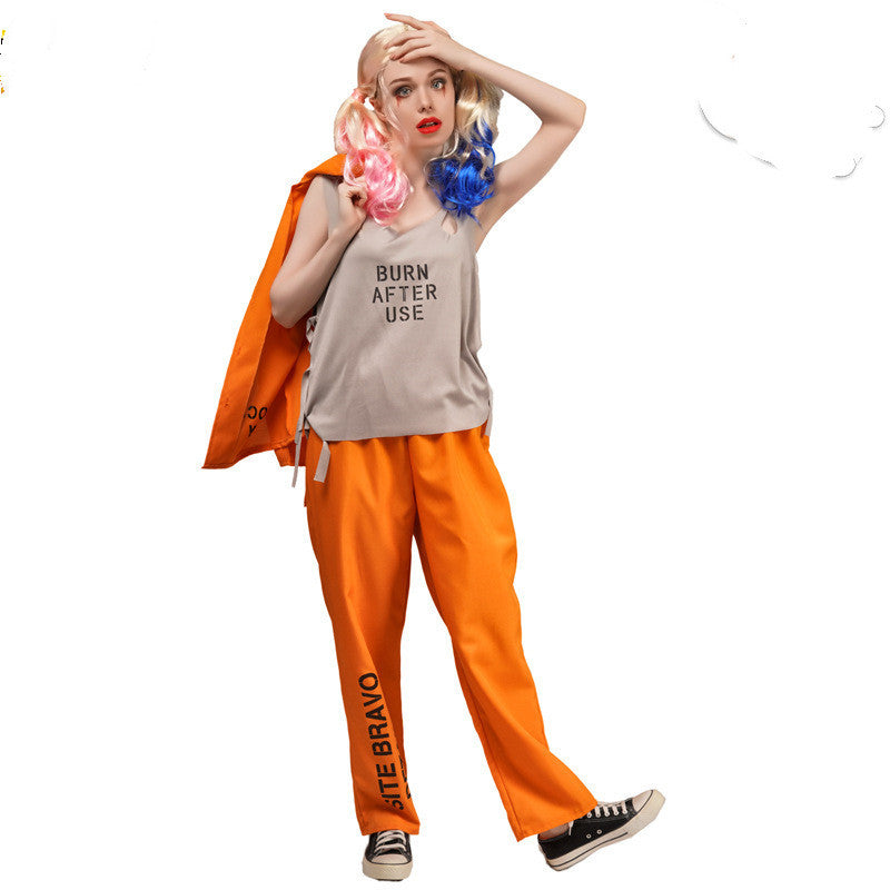Person wearing a tank top with text and orange pants on a white background