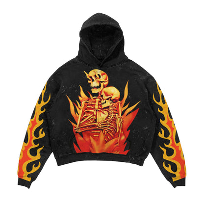 Black hoodie with a skeleton and flames design on a white background
