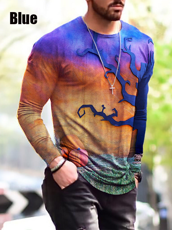 Man wearing a colorful long-sleeve shirt with a tree design in an outdoor setting