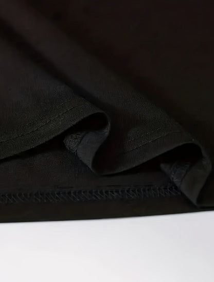 Close-up of black fabric with a white background