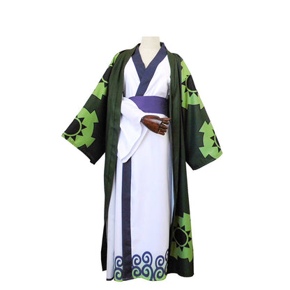 Traditional Japanese kimono with green and white patterns on a mannequin against a white background