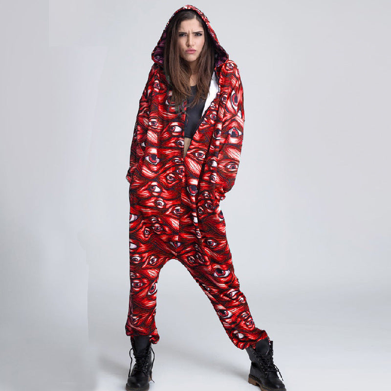 Person wearing a red patterned onesie against a white background