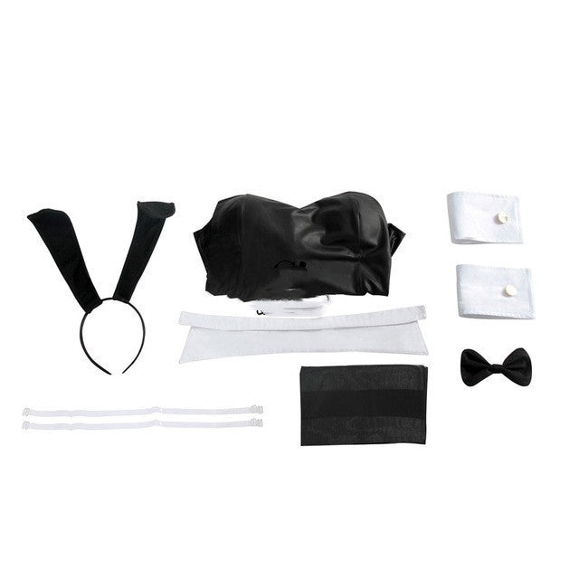 Collection of black and white accessories including a top, headband, bow tie, and more on a white background.