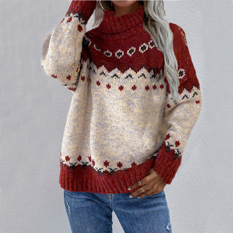 Person wearing a red and beige patterned sweater against a gray background